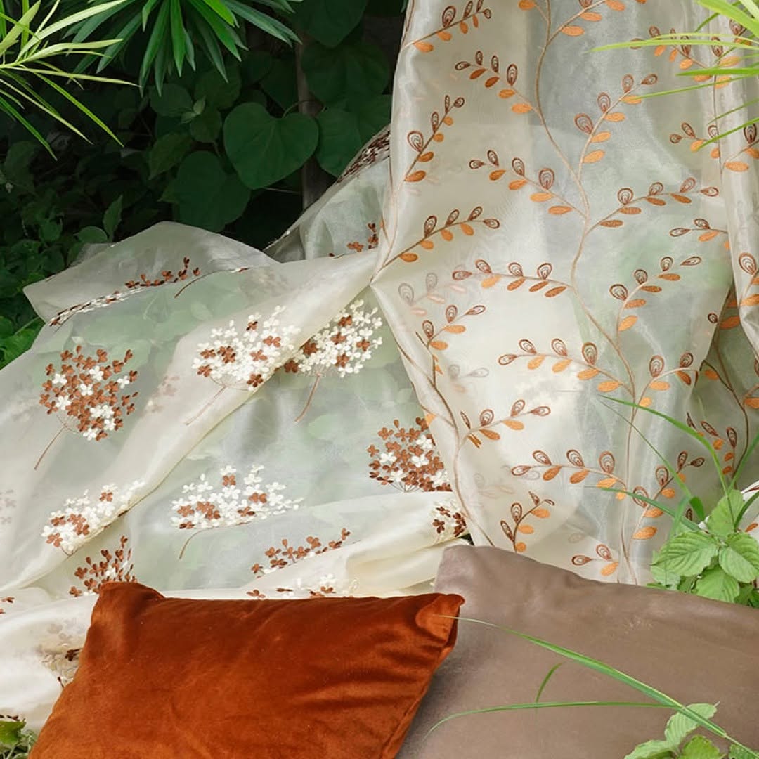 Neutral botanical curtain design direction