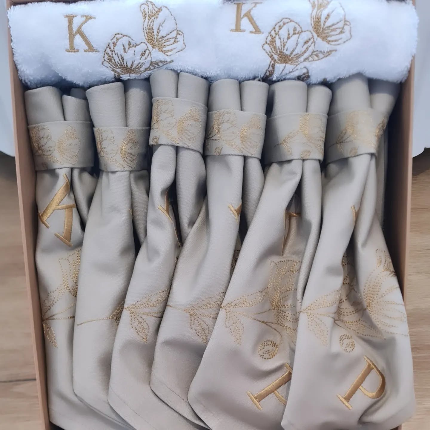 Coordinated Melchiah table linen gift set with embroidered napkins and towels