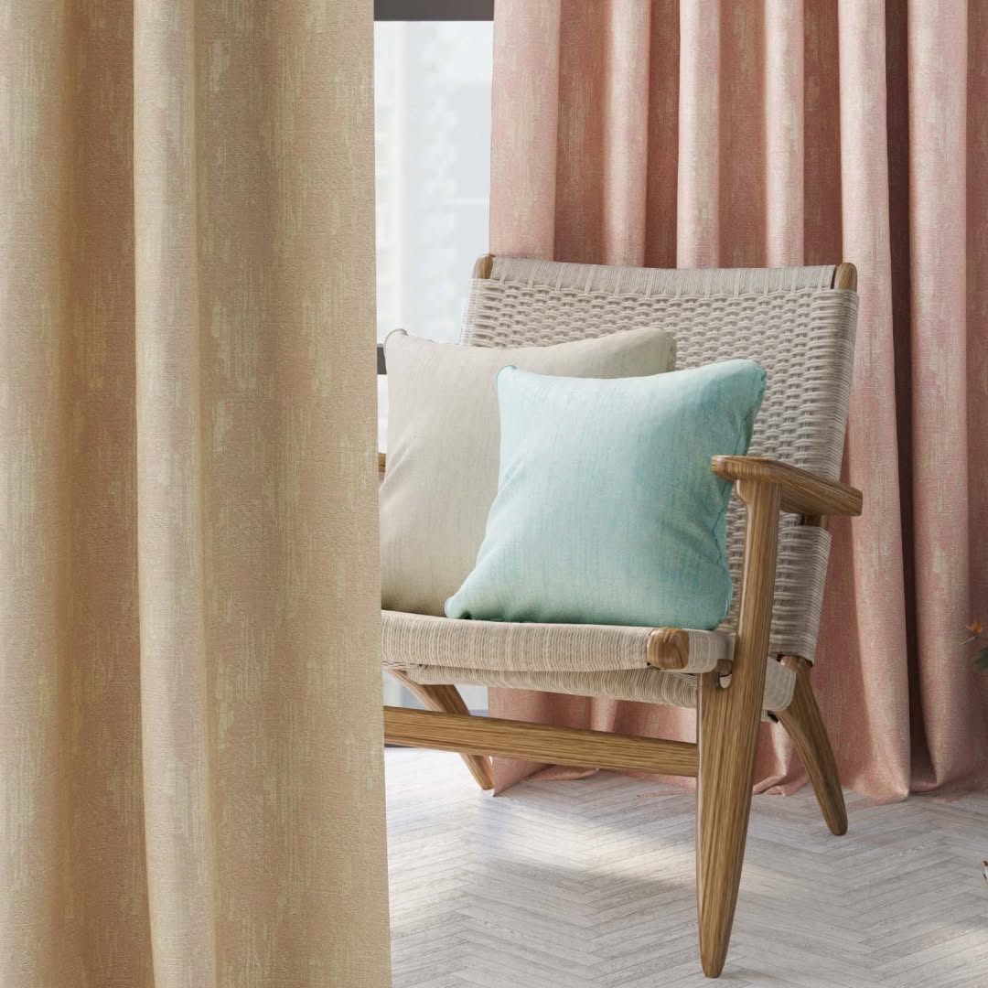 Melchiah blush and neutral curtains styled with a woven chair and aqua cushion