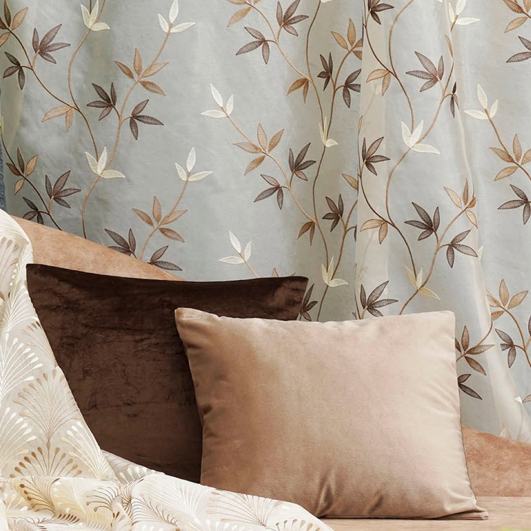 Cream Melchiah curtain embroidered with a botanical branch motif