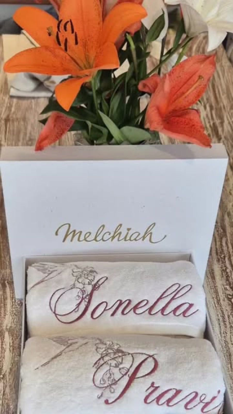 Personalised Melchiah towel gift set with orange lilies in a branded gift box