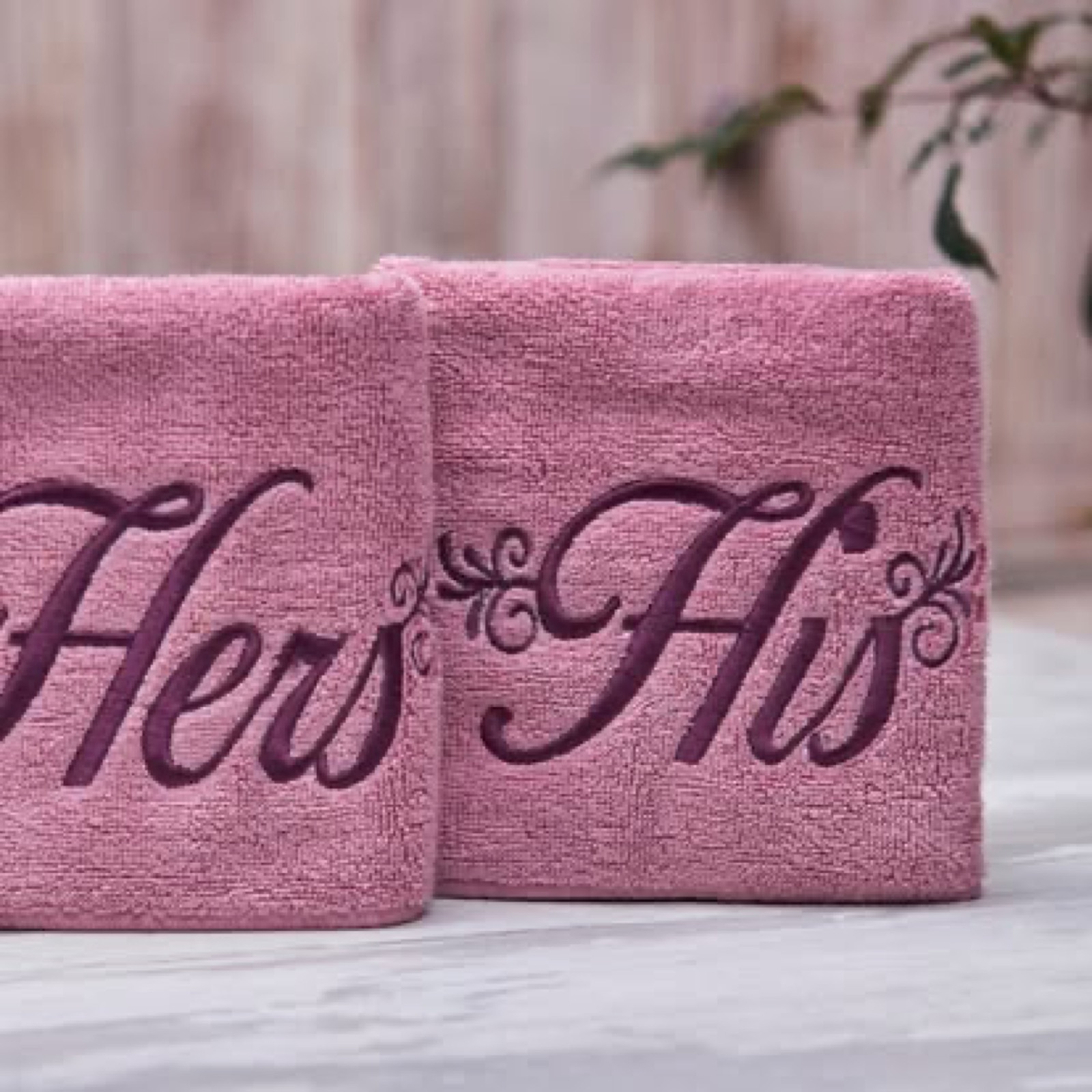 Melchiah rose bath towels personalised with His and Hers embroidery